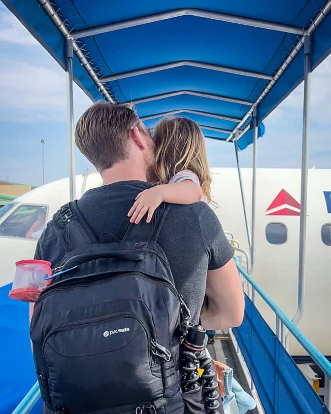 flying with a toddler boarding airplane