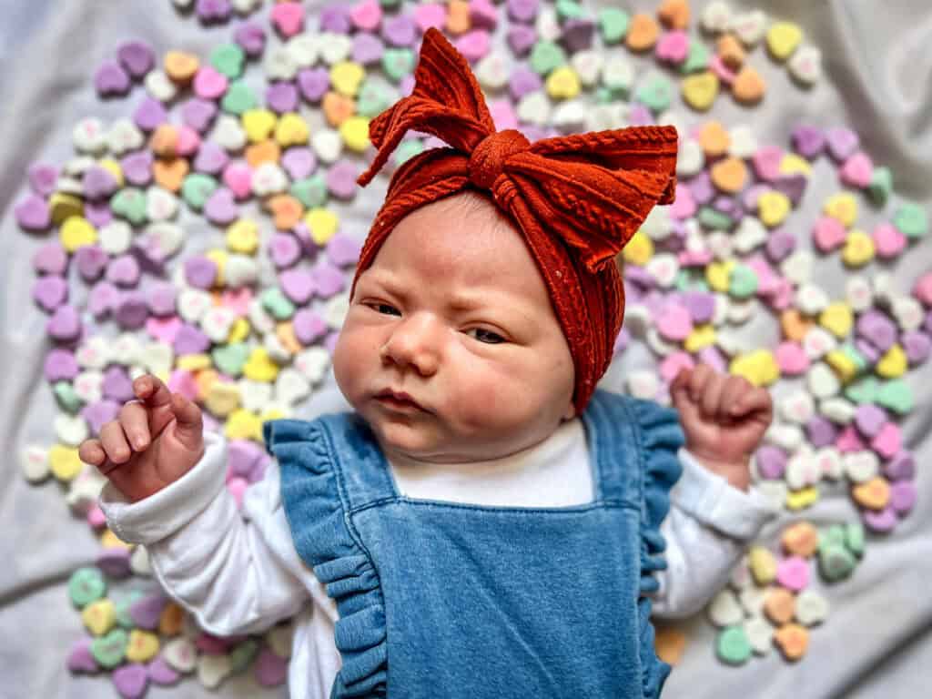 Birth story Senya Valentines Day candy hearts photo shoot